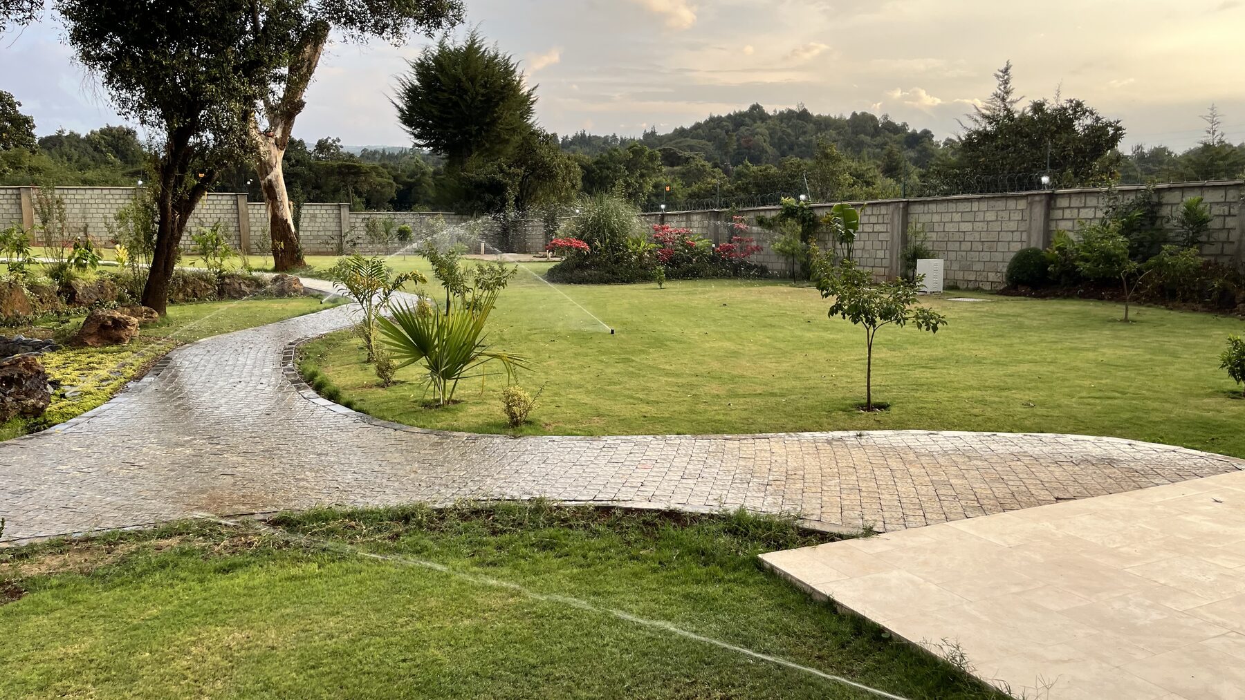 Completed landscaped grounds with paved pathway